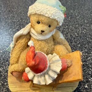 Adorable Bear Figurine with Santa Hat